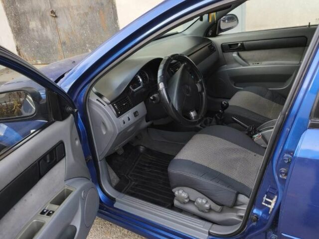 Синий Шевроле Лачетти, объемом двигателя 1.6 л и пробегом 200 тыс. км за 3550 $, фото 4 на Automoto.ua