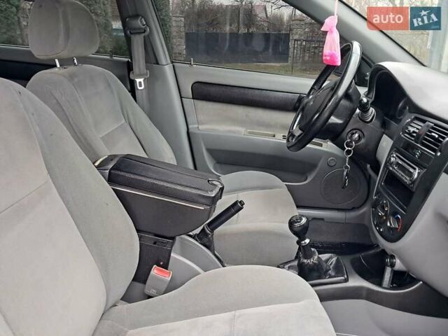 Синий Шевроле Лачетти, объемом двигателя 1.6 л и пробегом 199 тыс. км за 3849 $, фото 32 на Automoto.ua