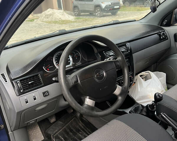 Синий Шевроле Лачетти, объемом двигателя 1.6 л и пробегом 215 тыс. км за 3499 $, фото 18 на Automoto.ua