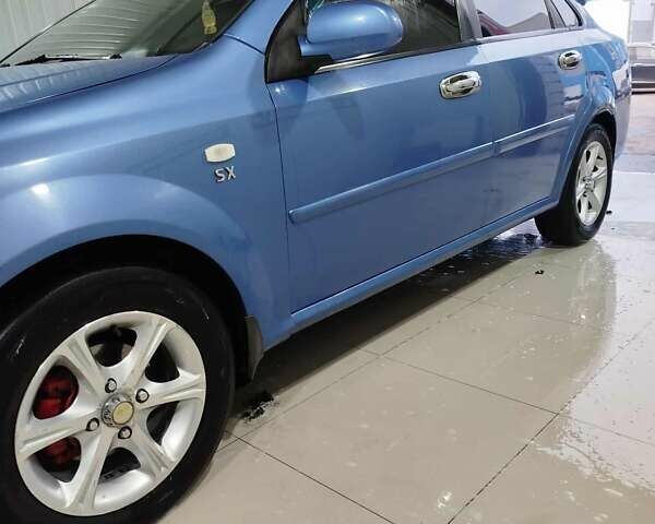 Синий Шевроле Лачетти, объемом двигателя 1.8 л и пробегом 233 тыс. км за 4700 $, фото 17 на Automoto.ua