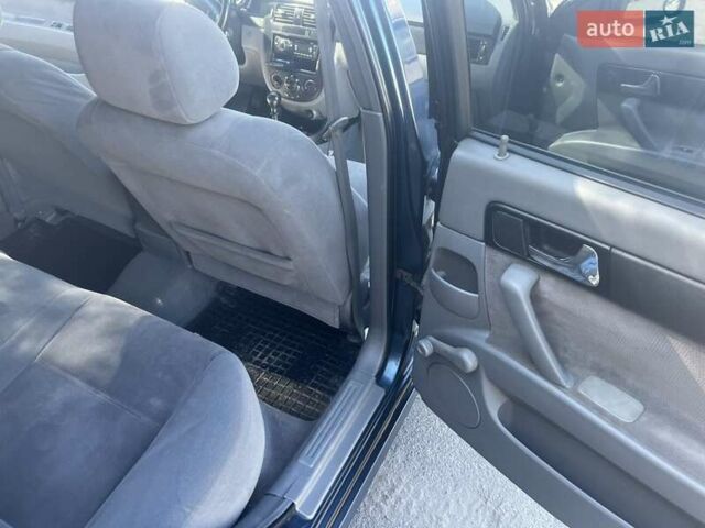 Синий Шевроле Лачетти, объемом двигателя 1.8 л и пробегом 125 тыс. км за 4300 $, фото 2 на Automoto.ua