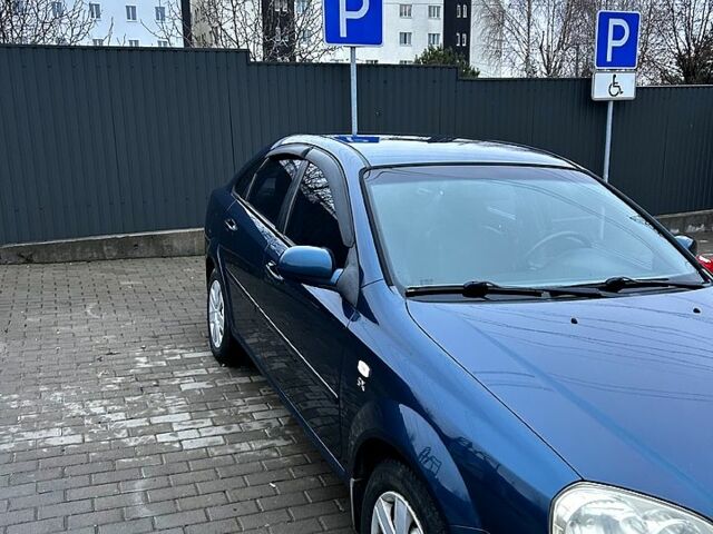 Синій Шевроле Лачетті, об'ємом двигуна 1.8 л та пробігом 221 тис. км за 4650 $, фото 8 на Automoto.ua