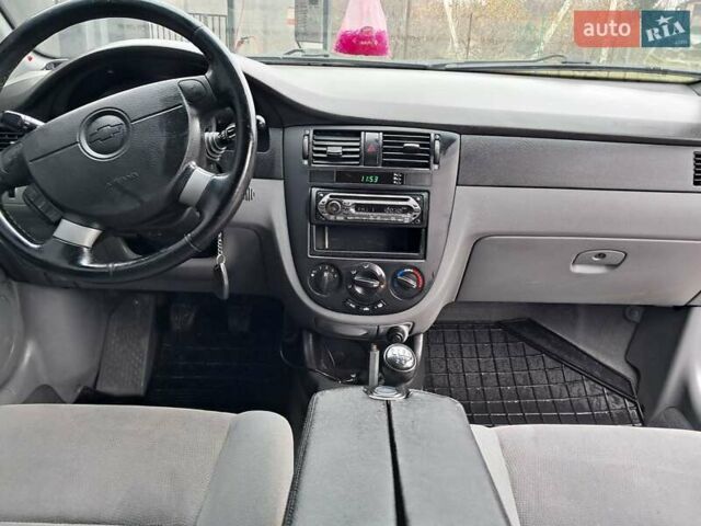 Синий Шевроле Лачетти, объемом двигателя 1.6 л и пробегом 199 тыс. км за 3849 $, фото 34 на Automoto.ua