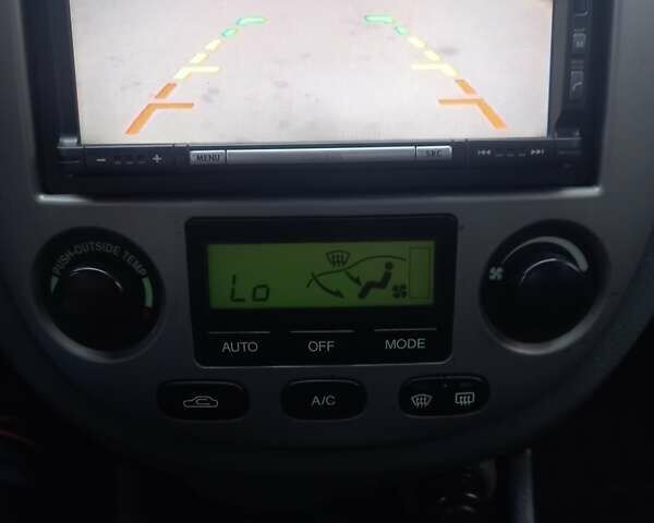 Синій Шевроле Лачетті, об'ємом двигуна 1.8 л та пробігом 290 тис. км за 4500 $, фото 6 на Automoto.ua