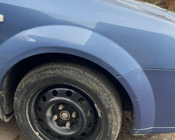 Синий Шевроле Лачетти, объемом двигателя 1.6 л и пробегом 198 тыс. км за 3300 $, фото 33 на Automoto.ua