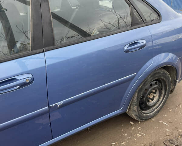 Синий Шевроле Лачетти, объемом двигателя 1.6 л и пробегом 198 тыс. км за 3300 $, фото 35 на Automoto.ua