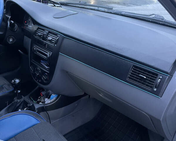 Синий Шевроле Лачетти, объемом двигателя 1.6 л и пробегом 198 тыс. км за 3300 $, фото 16 на Automoto.ua