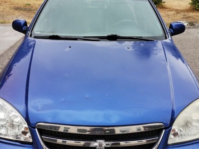 Синий Шевроле Лачетти, объемом двигателя 1.8 л и пробегом 321 тыс. км за 3100 $, фото 15 на Automoto.ua