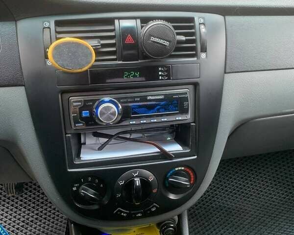Синій Шевроле Лачетті, об'ємом двигуна 1.8 л та пробігом 335 тис. км за 4000 $, фото 10 на Automoto.ua