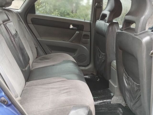 Синий Шевроле Лачетти, объемом двигателя 1.8 л и пробегом 321 тыс. км за 3100 $, фото 5 на Automoto.ua