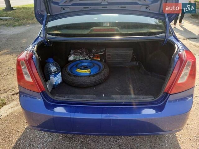 Синій Шевроле Лачетті, об'ємом двигуна 1.8 л та пробігом 290 тис. км за 4500 $, фото 10 на Automoto.ua