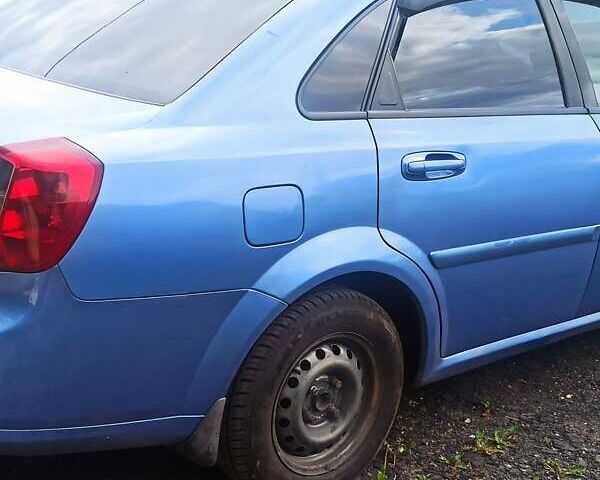 Синій Шевроле Лачетті, об'ємом двигуна 1.6 л та пробігом 330 тис. км за 3800 $, фото 11 на Automoto.ua