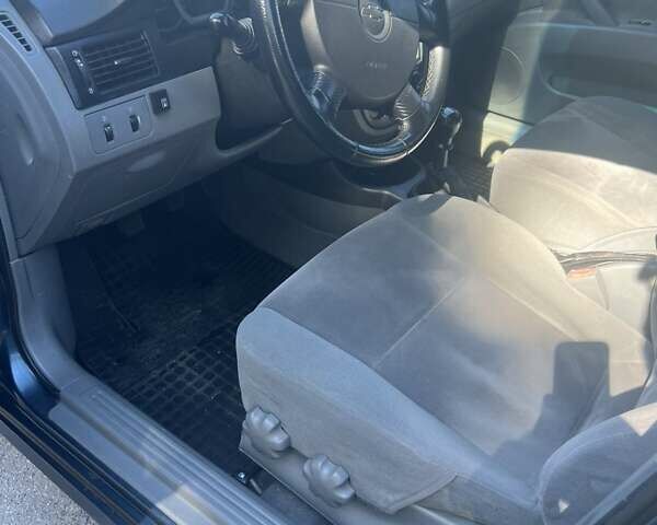 Синий Шевроле Лачетти, объемом двигателя 1.8 л и пробегом 125 тыс. км за 4300 $, фото 9 на Automoto.ua