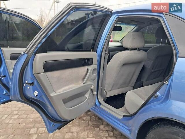 Синий Шевроле Лачетти, объемом двигателя 1.6 л и пробегом 199 тыс. км за 3849 $, фото 25 на Automoto.ua