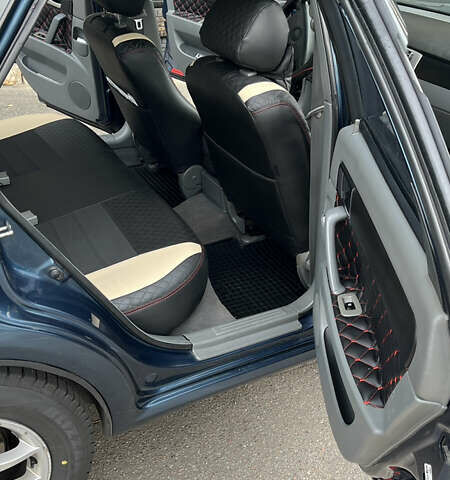 Синий Шевроле Лачетти, объемом двигателя 1.8 л и пробегом 267 тыс. км за 5700 $, фото 4 на Automoto.ua