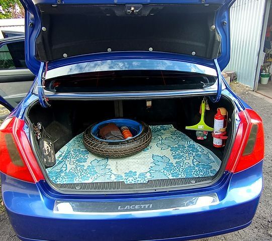 Синий Шевроле Лачетти, объемом двигателя 1.8 л и пробегом 193 тыс. км за 4900 $, фото 7 на Automoto.ua