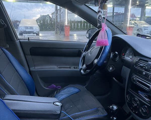 Синий Шевроле Лачетти, объемом двигателя 1.6 л и пробегом 198 тыс. км за 3300 $, фото 18 на Automoto.ua