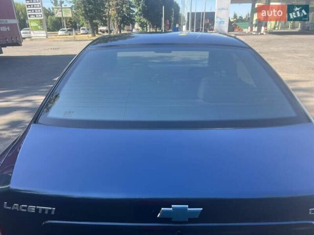 Синий Шевроле Лачетти, объемом двигателя 1.8 л и пробегом 125 тыс. км за 4300 $, фото 4 на Automoto.ua