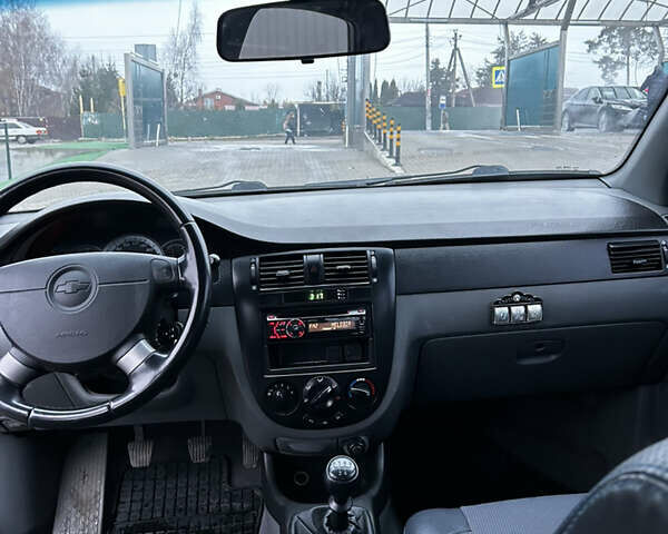 Синий Шевроле Лачетти, объемом двигателя 1.8 л и пробегом 221 тыс. км за 4650 $, фото 16 на Automoto.ua