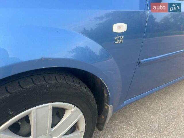 Синій Шевроле Лачетті, об'ємом двигуна 1.8 л та пробігом 115 тис. км за 5099 $, фото 10 на Automoto.ua