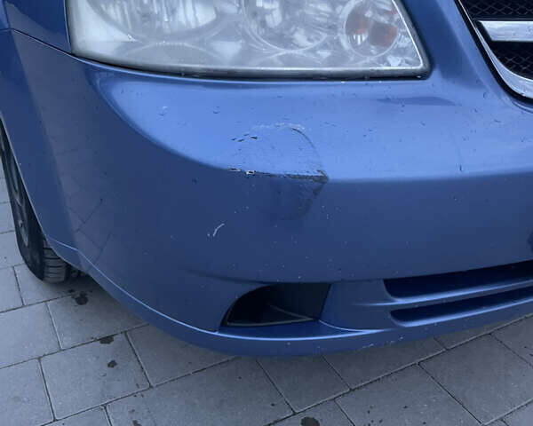 Синий Шевроле Лачетти, объемом двигателя 1.6 л и пробегом 198 тыс. км за 3300 $, фото 2 на Automoto.ua