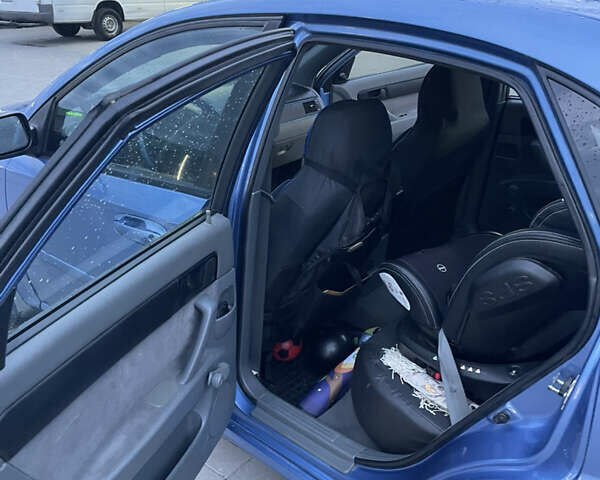 Синий Шевроле Лачетти, объемом двигателя 1.6 л и пробегом 198 тыс. км за 3300 $, фото 24 на Automoto.ua