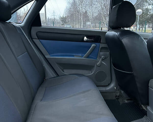 Синий Шевроле Лачетти, объемом двигателя 1.8 л и пробегом 221 тыс. км за 4650 $, фото 17 на Automoto.ua