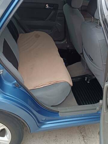 Синий Шевроле Лачетти, объемом двигателя 1.8 л и пробегом 233 тыс. км за 4700 $, фото 7 на Automoto.ua