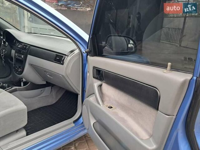 Синий Шевроле Лачетти, объемом двигателя 1.6 л и пробегом 199 тыс. км за 3849 $, фото 30 на Automoto.ua