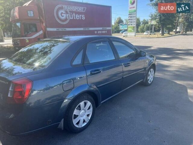 Синий Шевроле Лачетти, объемом двигателя 1.8 л и пробегом 125 тыс. км за 4300 $, фото 5 на Automoto.ua