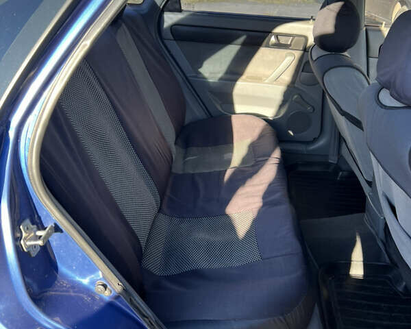 Синий Шевроле Лачетти, объемом двигателя 1.6 л и пробегом 215 тыс. км за 3499 $, фото 4 на Automoto.ua