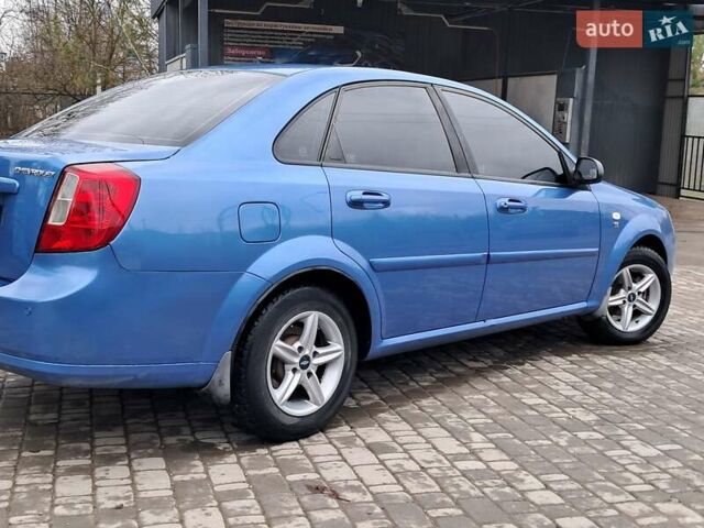 Синий Шевроле Лачетти, объемом двигателя 1.6 л и пробегом 199 тыс. км за 3849 $, фото 7 на Automoto.ua