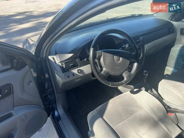 Синий Шевроле Лачетти, объемом двигателя 1.8 л и пробегом 125 тыс. км за 4300 $, фото 3 на Automoto.ua