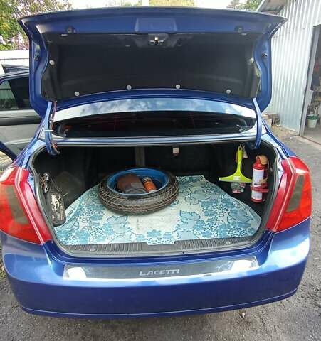 Синий Шевроле Лачетти, объемом двигателя 1.8 л и пробегом 193 тыс. км за 4900 $, фото 4 на Automoto.ua