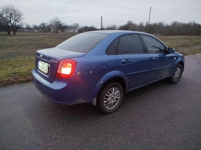 Синий Шевроле Лачетти, объемом двигателя 1.8 л и пробегом 260 тыс. км за 4500 $, фото 2 на Automoto.ua