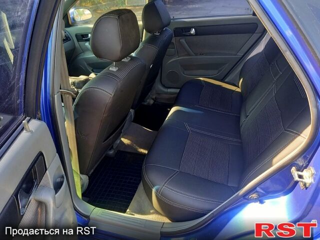 Синій Шевроле Лачетті, об'ємом двигуна 1.8 л та пробігом 290 тис. км за 4500 $, фото 3 на Automoto.ua