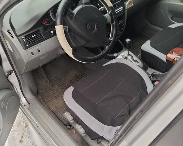 Синій Шевроле Лачетті, об'ємом двигуна 1.8 л та пробігом 250 тис. км за 3450 $, фото 4 на Automoto.ua