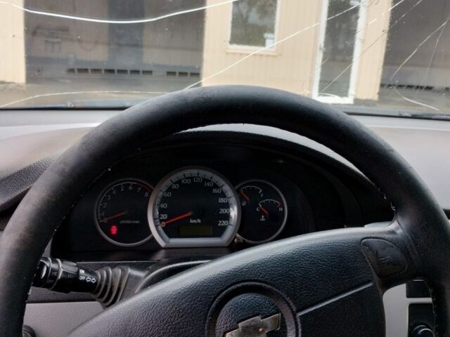 Синий Шевроле Лачетти, объемом двигателя 1.8 л и пробегом 321 тыс. км за 3100 $, фото 3 на Automoto.ua