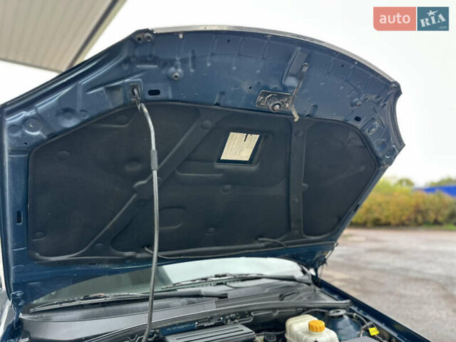 Синий Шевроле Лачетти, объемом двигателя 1.8 л и пробегом 234 тыс. км за 4350 $, фото 59 на Automoto.ua