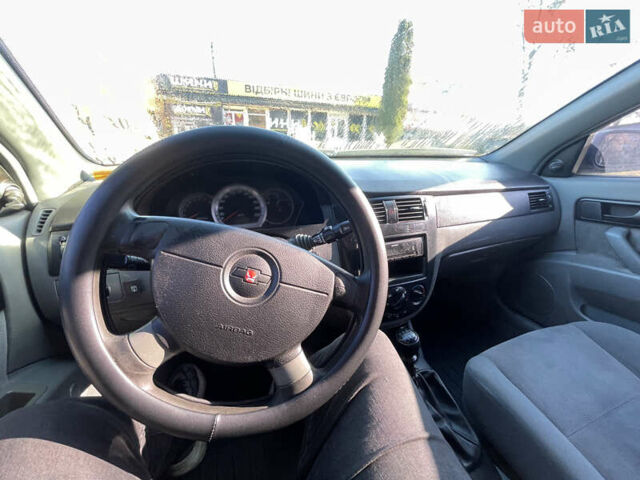 Синій Шевроле Лачетті, об'ємом двигуна 1.6 л та пробігом 230 тис. км за 3100 $, фото 8 на Automoto.ua