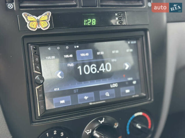 Синий Шевроле Лачетти, объемом двигателя 1.8 л и пробегом 234 тыс. км за 4350 $, фото 43 на Automoto.ua