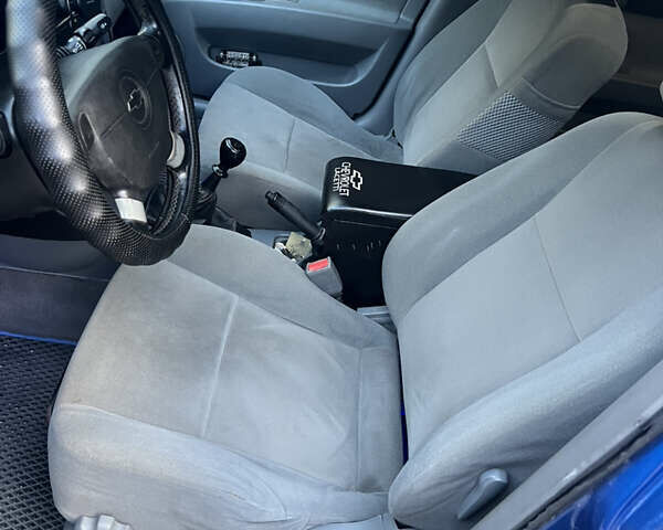 Синий Шевроле Лачетти, объемом двигателя 1.8 л и пробегом 237 тыс. км за 4600 $, фото 11 на Automoto.ua