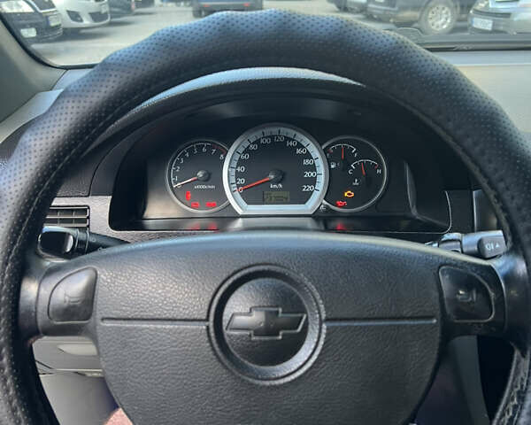 Синий Шевроле Лачетти, объемом двигателя 1.8 л и пробегом 237 тыс. км за 4600 $, фото 13 на Automoto.ua