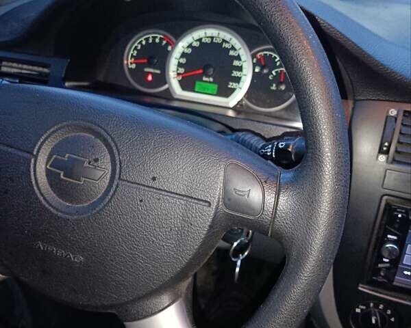 Синий Шевроле Лачетти, объемом двигателя 1.6 л и пробегом 107 тыс. км за 6000 $, фото 4 на Automoto.ua