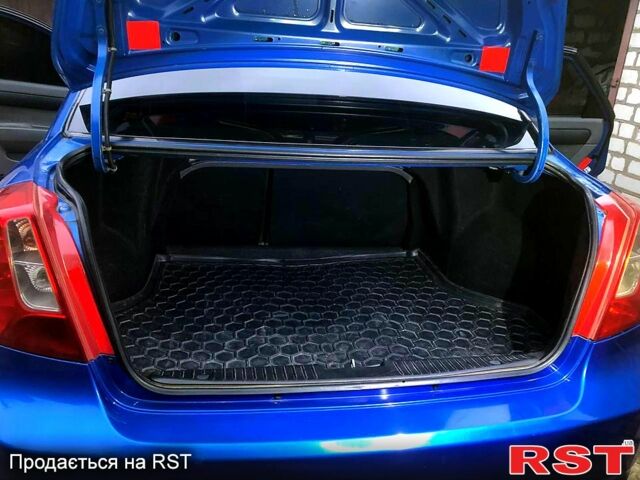 Синій Шевроле Лачетті, об'ємом двигуна 1.8 л та пробігом 200 тис. км за 5000 $, фото 5 на Automoto.ua