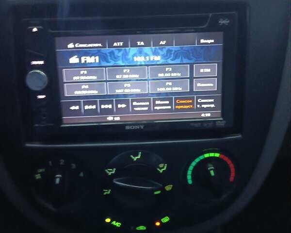 Синий Шевроле Лачетти, объемом двигателя 1.6 л и пробегом 107 тыс. км за 6000 $, фото 5 на Automoto.ua