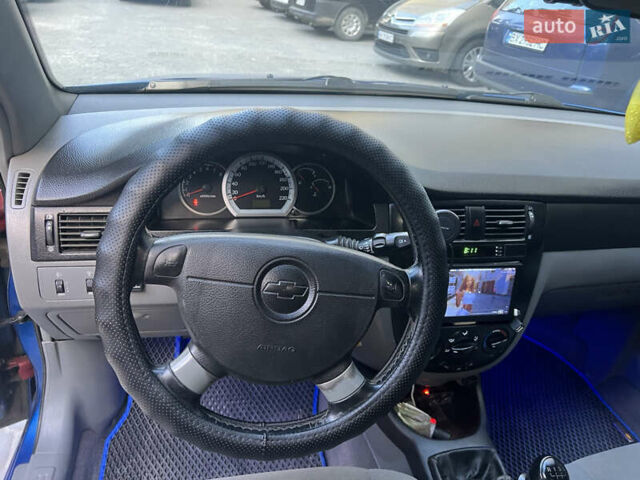 Синий Шевроле Лачетти, объемом двигателя 1.8 л и пробегом 237 тыс. км за 4600 $, фото 12 на Automoto.ua