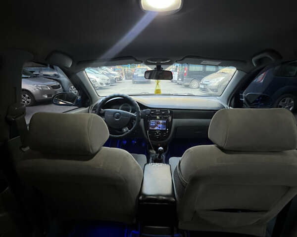 Синий Шевроле Лачетти, объемом двигателя 1.8 л и пробегом 237 тыс. км за 4600 $, фото 8 на Automoto.ua