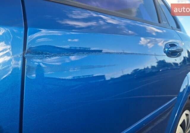 Синий Шевроле Лачетти, объемом двигателя 1.6 л и пробегом 246 тыс. км за 4100 $, фото 24 на Automoto.ua