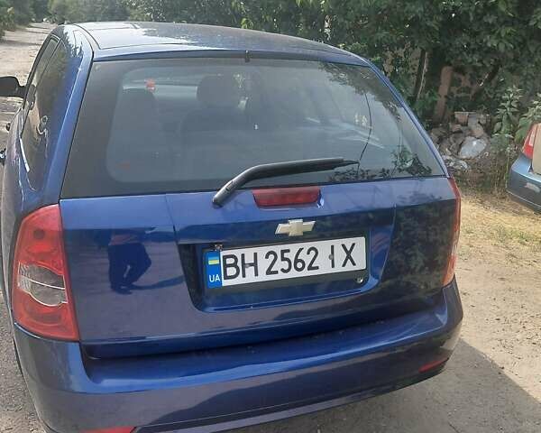 Синий Шевроле Лачетти, объемом двигателя 1.8 л и пробегом 300 тыс. км за 3976 $, фото 3 на Automoto.ua